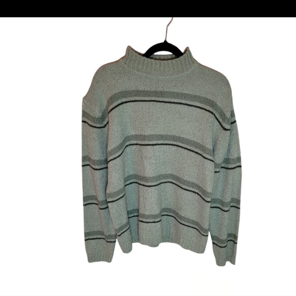 Carolyn Taylor Green sweater with horizontal brown and green stripes.